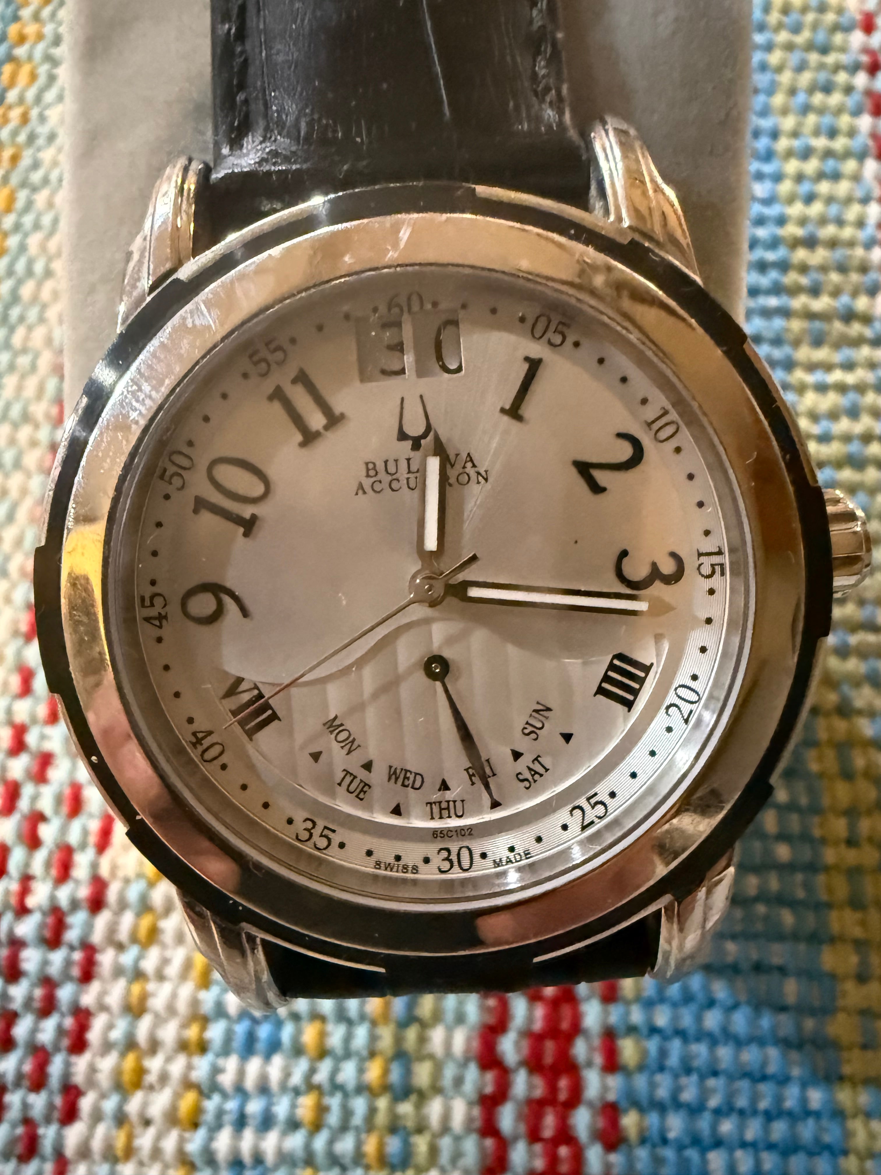 Men’s used designer Bulova watch.
