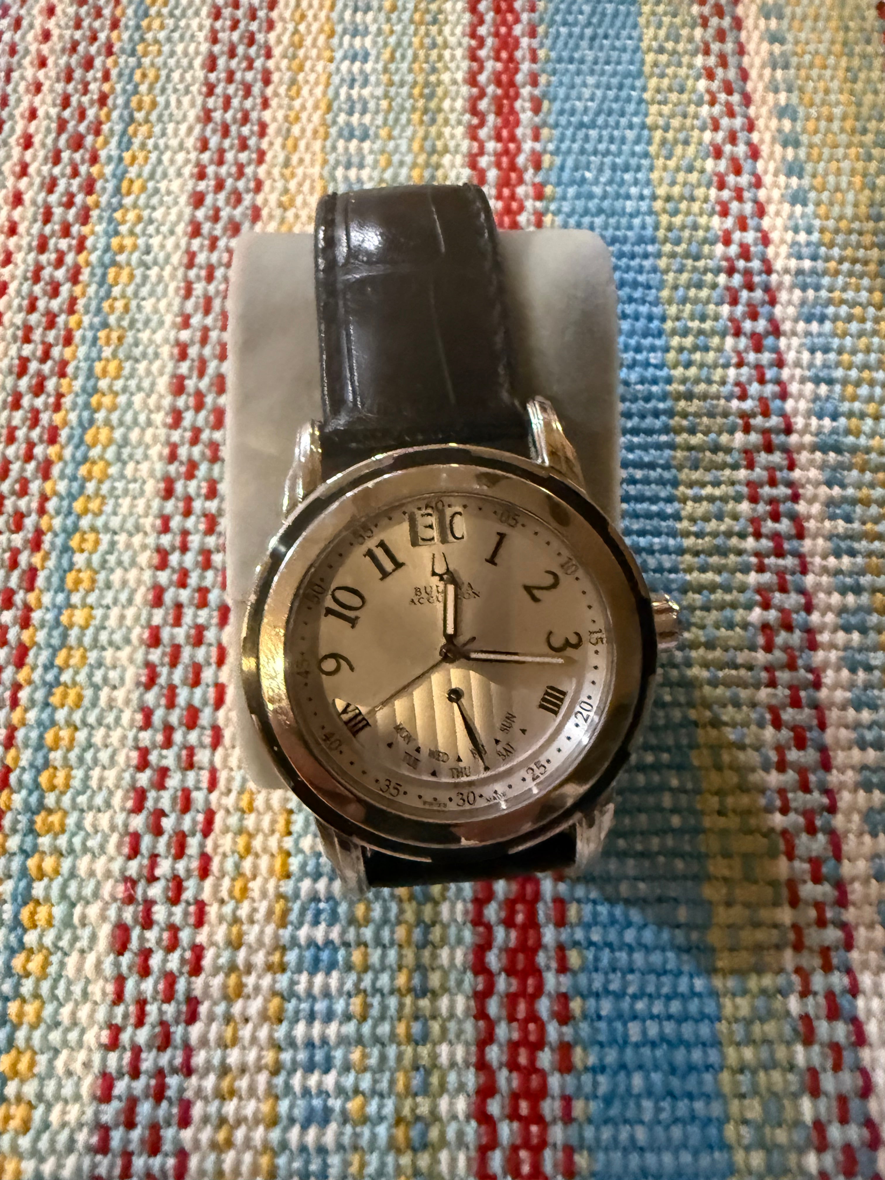 Men’s used designer Bulova watch.